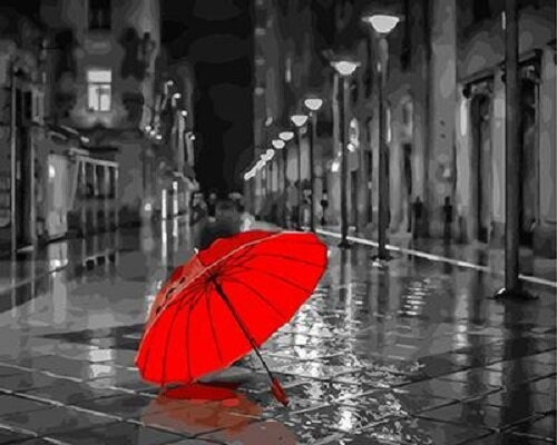 Красный зонт на тротуаре